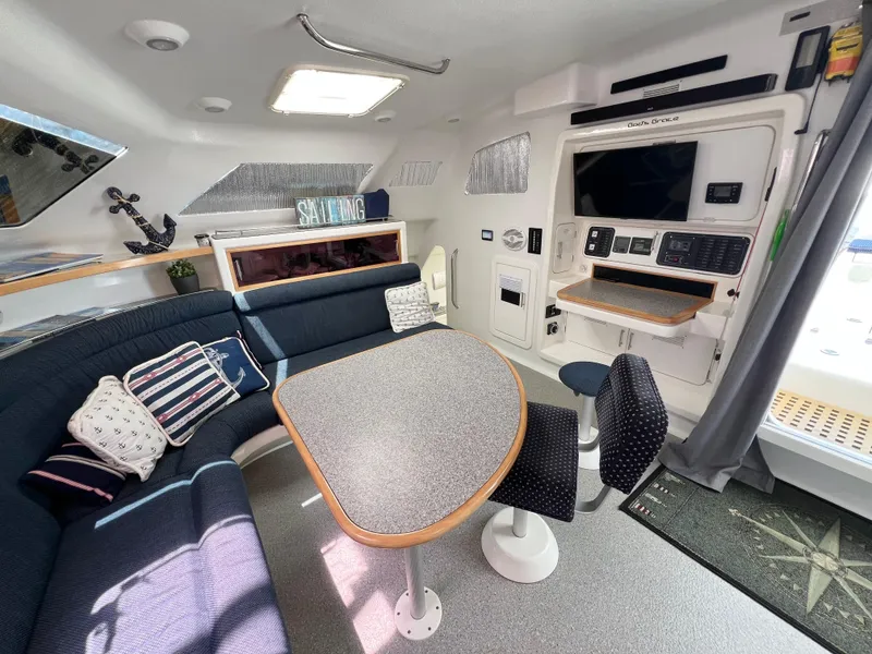 Slide: The Image of Interior of 2010 Voyage Yachts 500 with cozy seating and modern amenities. - 29