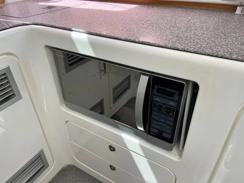 Slide: The Image of Microwave in Voyage Yachts 500, 2010 model, sleek kitchen design. - 34
