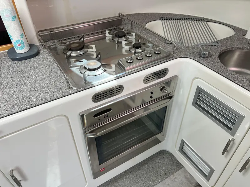 Slide: The Image of Modern kitchen in 2010 Voyage Yachts 500 with stove, oven, and sink. - 35
