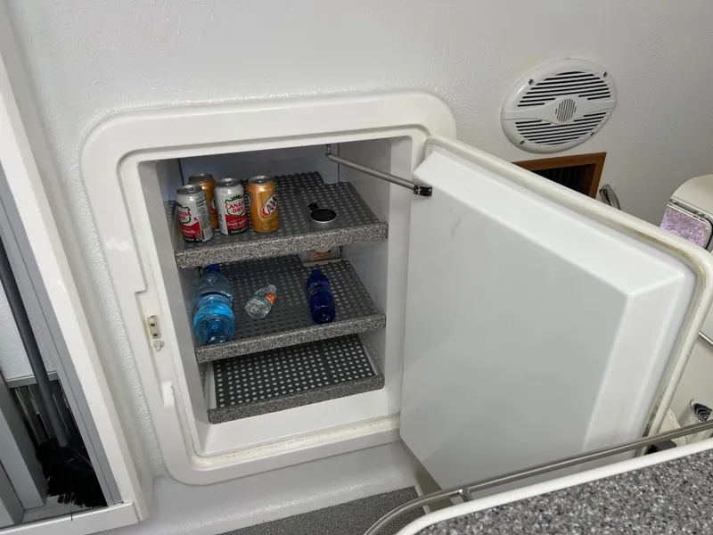 Slide: The Image of Mini fridge on Voyage Yachts 500, 2010 model, stocked with drinks. - 39