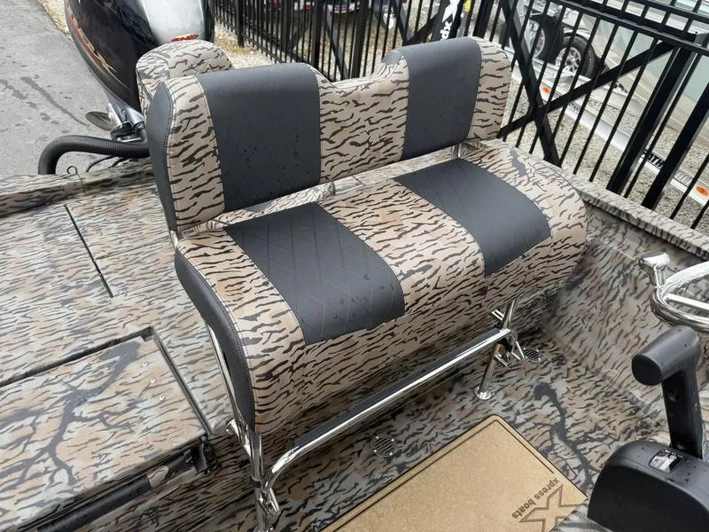 Slide: The Image of 2025 Xpress H22B Bay boat seat with camouflage pattern and sturdy metal frame. - 10