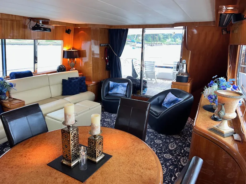 Slide: The Image of Luxurious 2001 Horizon Skylounge interior with elegant seating, dining area, and decorative accents. - 12