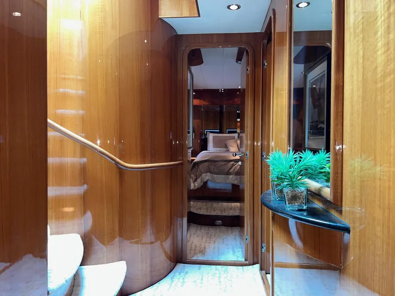 Slide: The Image of Luxurious interior of 2001 Horizon Skylounge yacht with polished wood and elegant decor. - 37