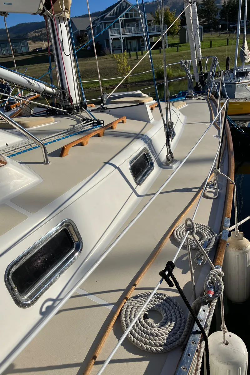 Slide: The Image of Sailboat deck view of 2007 Tartan 3400, featuring rigging and docked setting. - 14