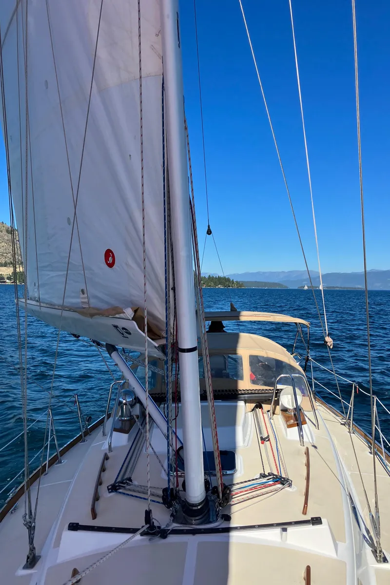 Slide: The Image of Sailing on a 2007 Tartan 3400 yacht in clear blue waters. - 22