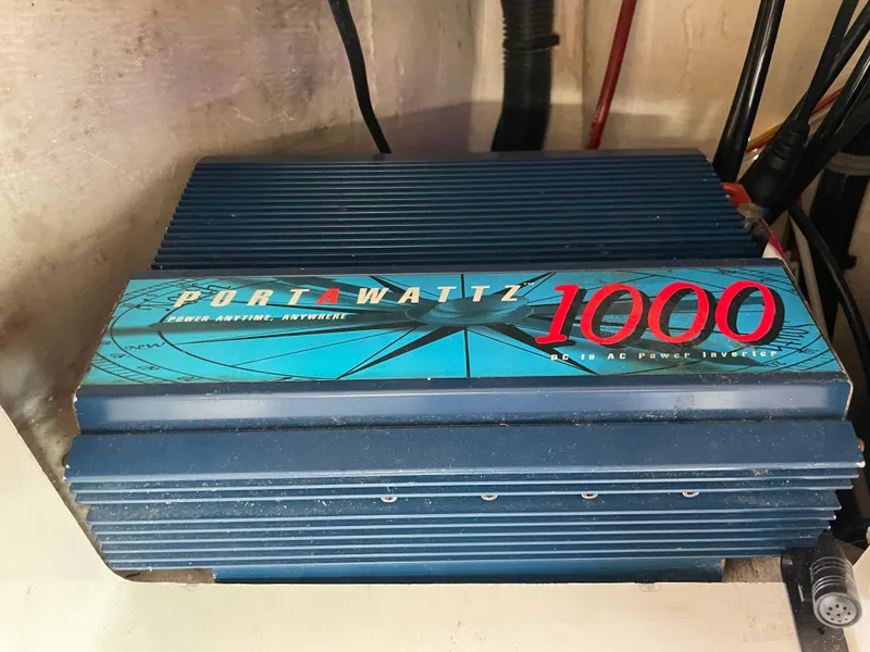 Slide: The Image of PortaWattz 1000 power inverter in a 1997 Cabo 31 Express boat. - 24