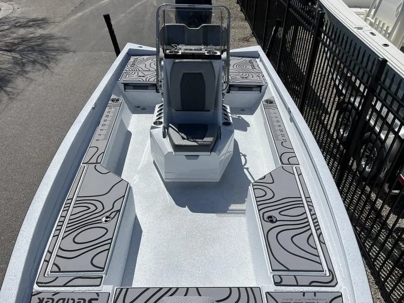 Slide: The Image of 2025 Xpress H22B boat with sleek design and patterned deck, viewed from above. - 6
