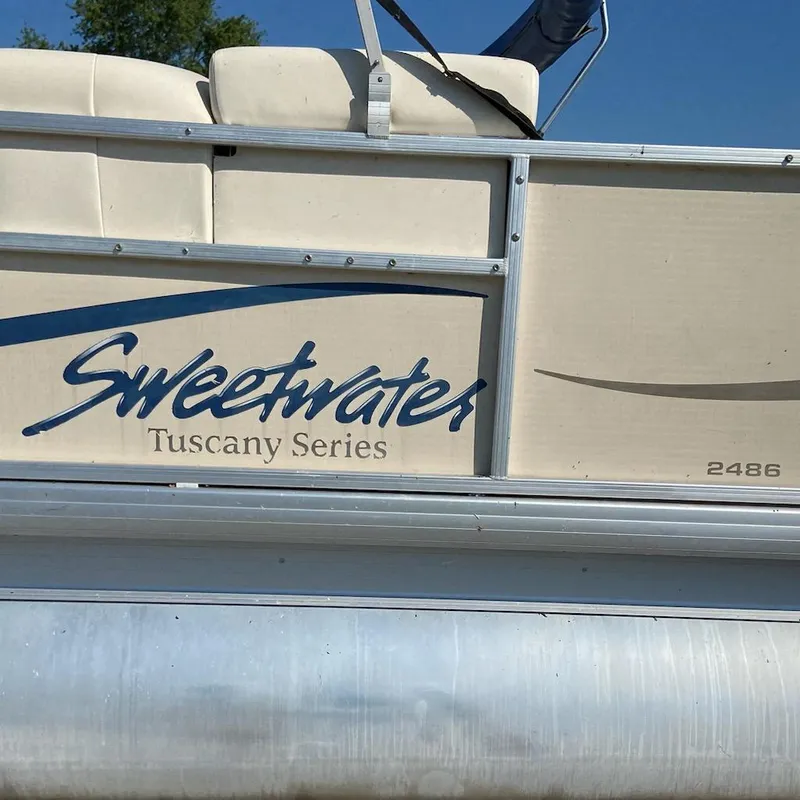 Slide: The Image of 2008 Godfrey Sweetwater SWT 2486 FC pontoon boat, Tuscany Series branding visible. - 11