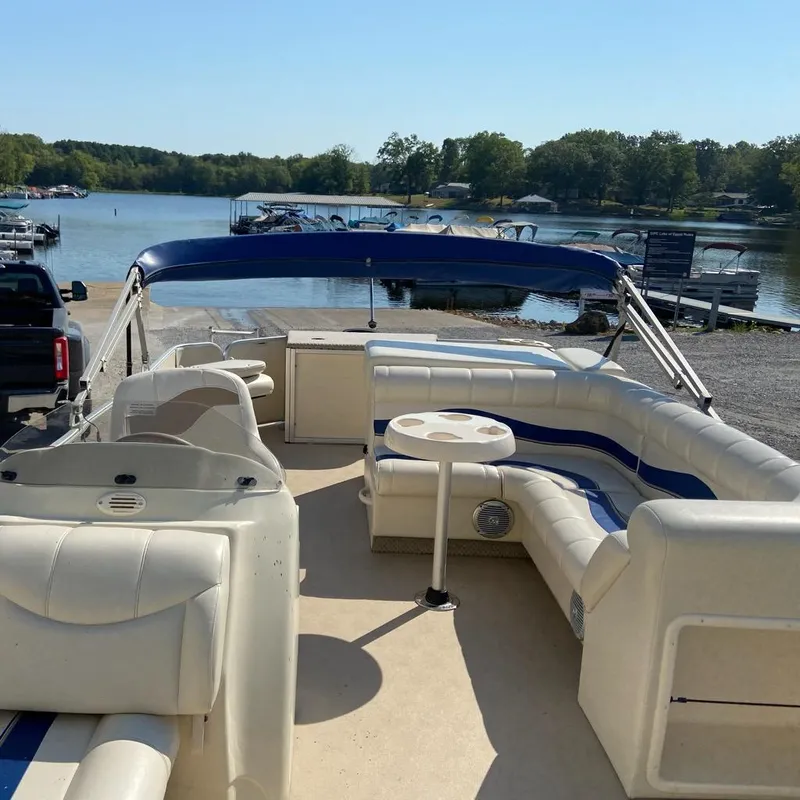 Slide: The Image of 2008 Godfrey Sweetwater SWT 2486 FC pontoon boat at a lakeside dock. - 3