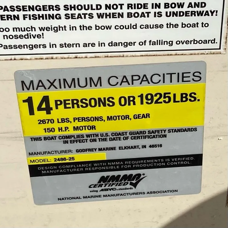 Slide: The Image of 2008 Godfrey Sweetwater SWT 2486 FC capacity label: 14 persons or 1925 lbs, 150 HP motor. - 4