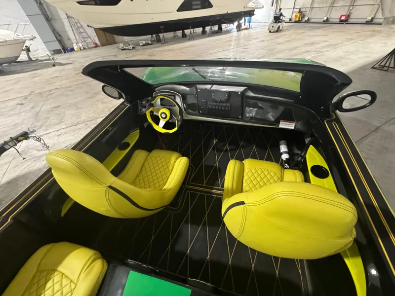 Slide: The Image of 2023 Watersports Car Series B interior with yellow seats and sleek dashboard design. - 5