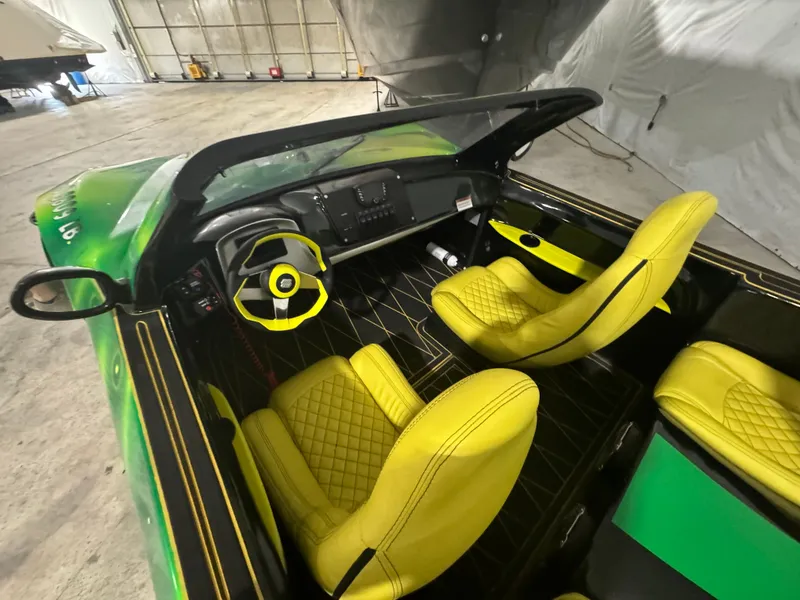 Slide: The Image of 2023 Watersports Car Series B interior with yellow seats and modern dashboard. - 8