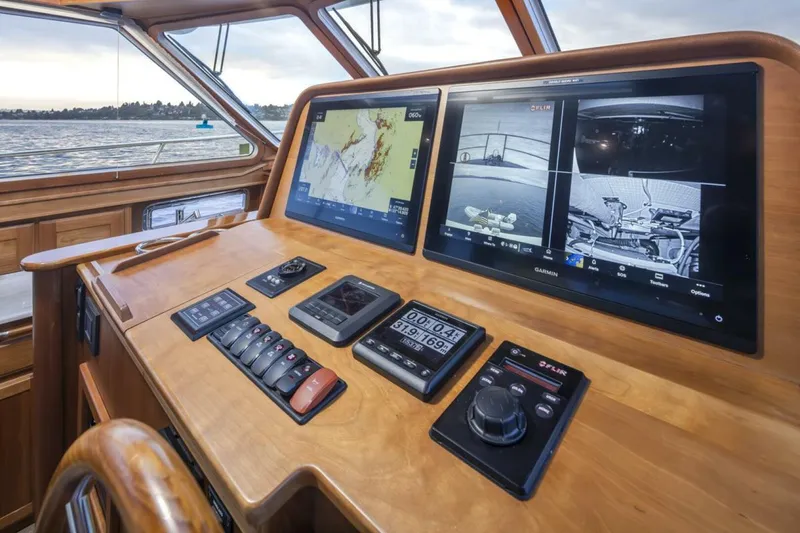 Slide: The Image of 2018 Sabre 45 Salon Express helm with advanced navigation and control systems. - 22