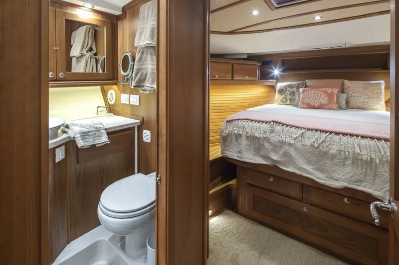 Slide: The Image of Luxurious interior of 2018 Sabre 45 Salon Express yacht with cozy bedroom and bathroom. - 9