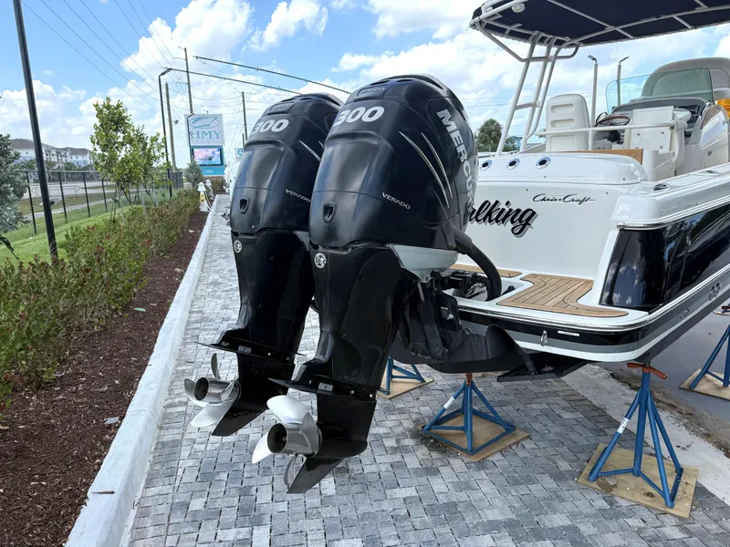 Slide: The Image of 2014 Chris-Craft Catalina 29 with twin Mercury outboard engines on display. - 22