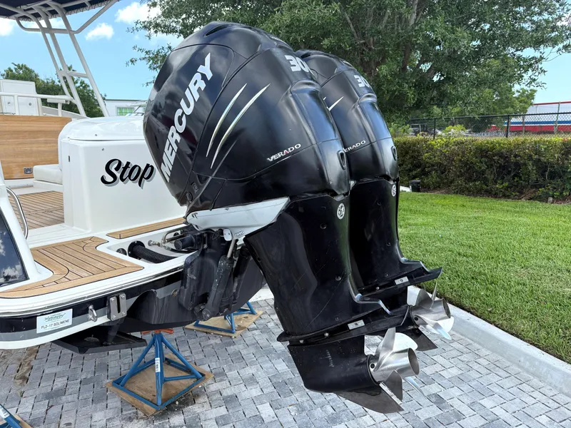 Slide: The Image of 2014 Chris-Craft Catalina 29 with twin Mercury Verado outboard engines on display. - 23