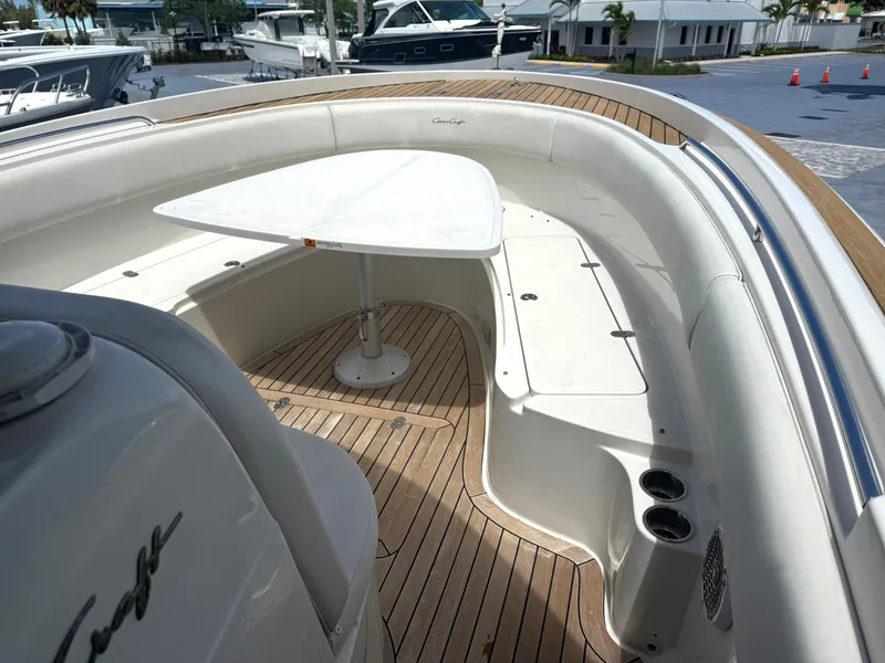 Slide: The Image of 2014 Chris-Craft Catalina 29 boat with teak deck and seating area. - 8