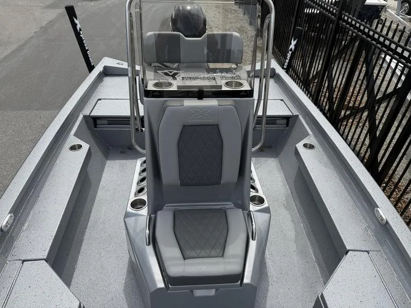 Slide: The Image of 2025 Xpress H20B boat interior with sleek seating and modern design. - 9
