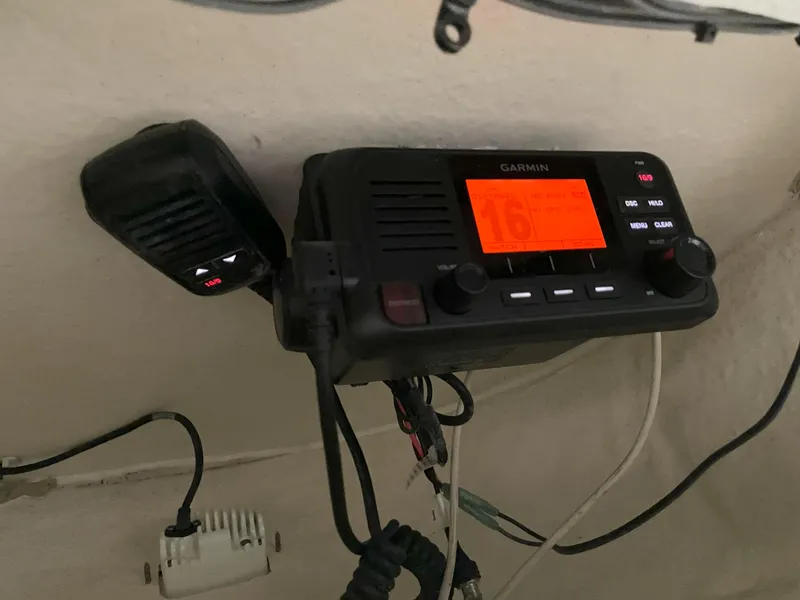 Slide: The Image of Garmin marine radio installed on 2024 Key West 210 Bay Reef boat. - 31