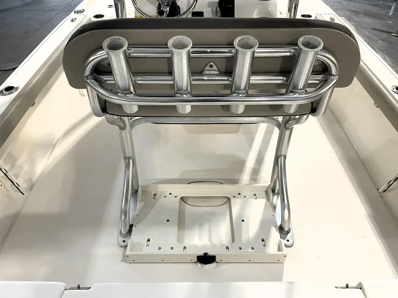 Slide: The Image of 2024 Key West 210 Bay Reef boat interior with rod holders and seating. - 39