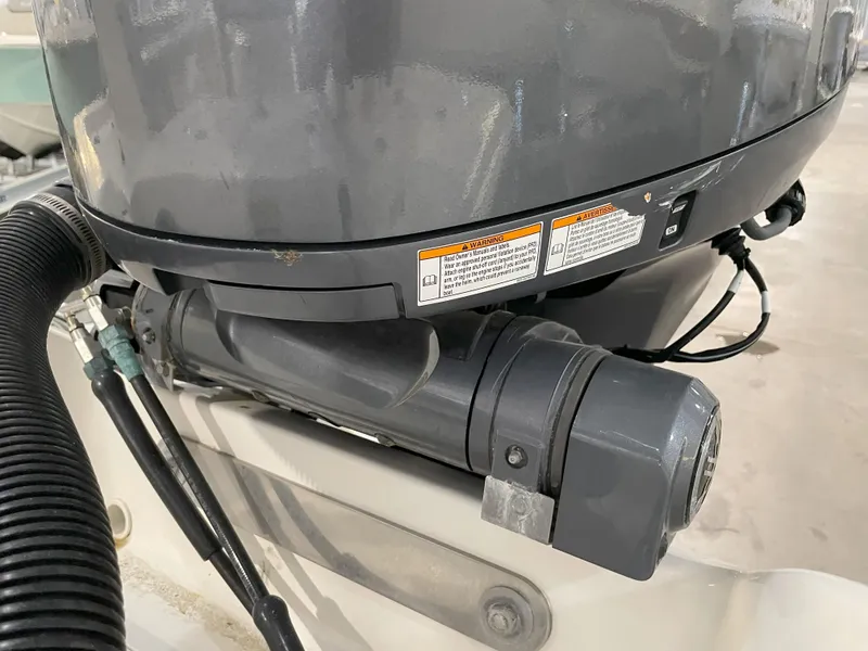 Slide: The Image of Close-up of a 2024 Key West 210 Bay Reef boat engine component. - 41