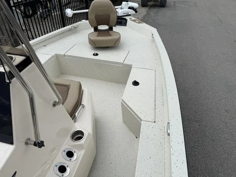 Slide: The Image of 2025 Xpress H20B boat deck with seating and storage compartments. - 6