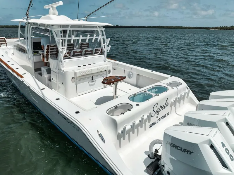 Slide: The Image of 2024 Front Runner 47 Center Console boat on water, featuring Mercury engines. - 12