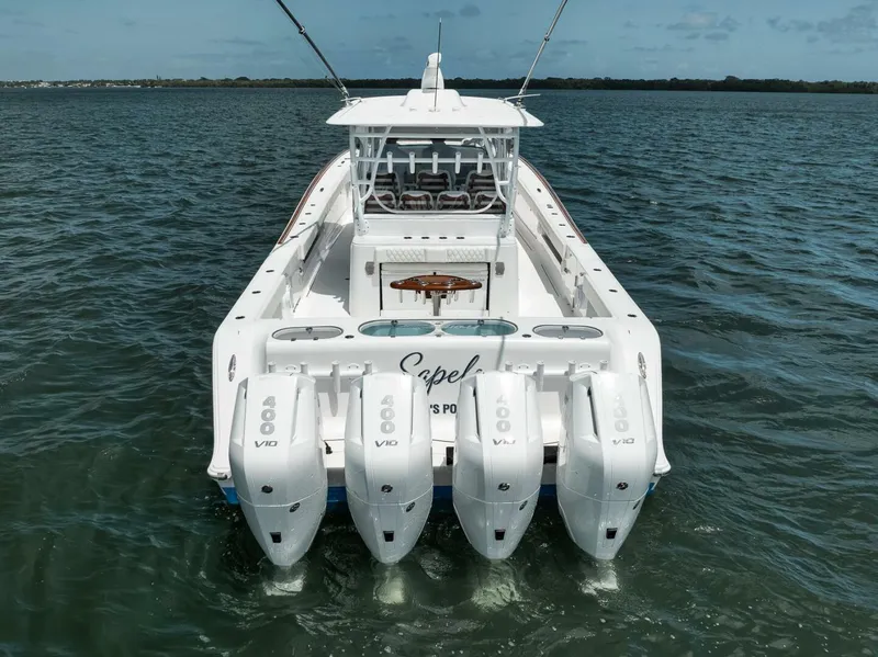 Slide: The Image of 2024 Front Runner 47 Center Console boat with five powerful outboard engines on the water. - 14