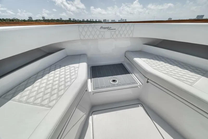 Slide: The Image of 2024 Front Runner 47 Center Console boat interior with luxurious seating and sleek design. - 18