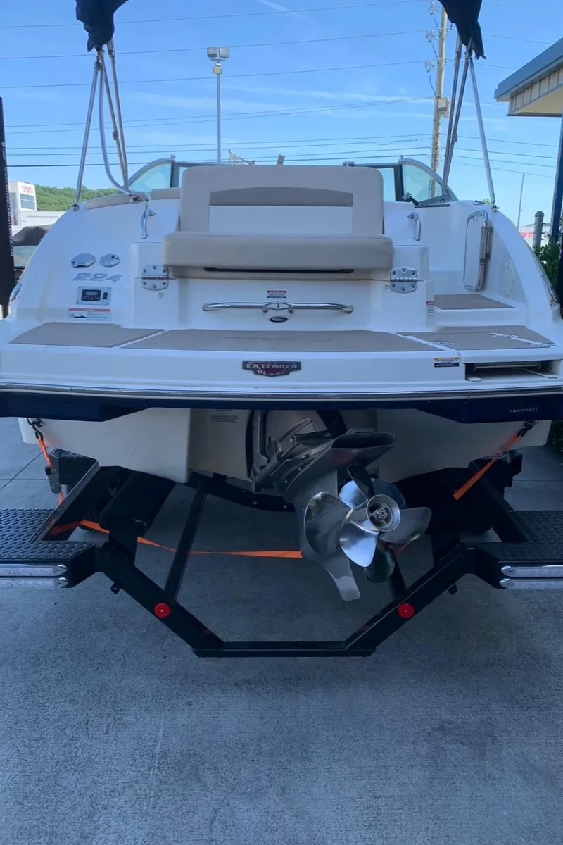 Slide: The Image of 2012 Chaparral 224 Sunesta boat, rear view with propeller and seating area. - 6