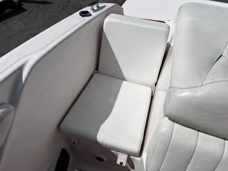 Slide: The Image of White seating area on a 2006 Regal 1900 Bowrider boat. - 11