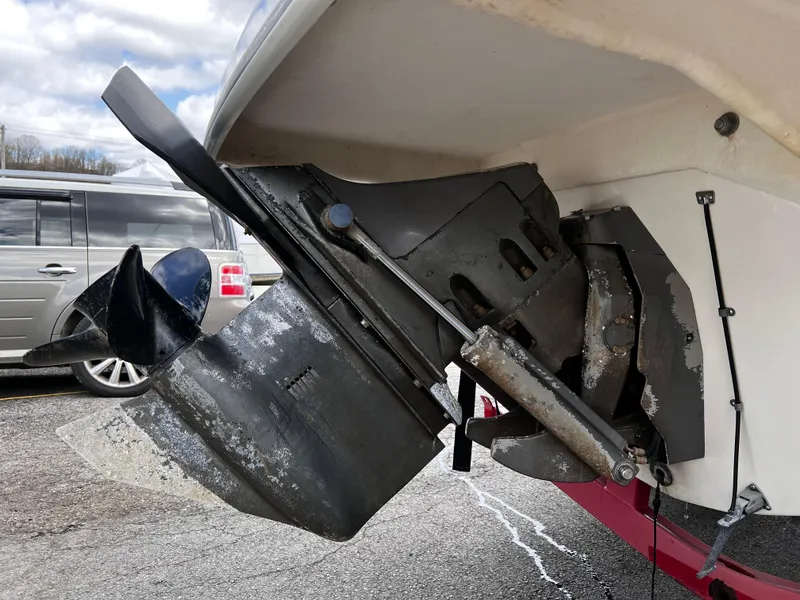 Slide: The Image of 2006 Regal 1900 Bowrider boat stern drive and propeller detail. - 13