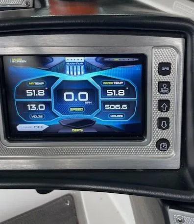 Slide: The Image of 2015 MasterCraft X23 dashboard display showing air and water temperature, speed, and engine hours. - 20