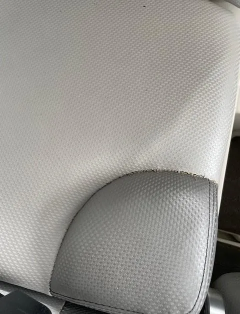 Slide: The Image of 2015 MasterCraft X23 boat seat with textured upholstery detail. - 26