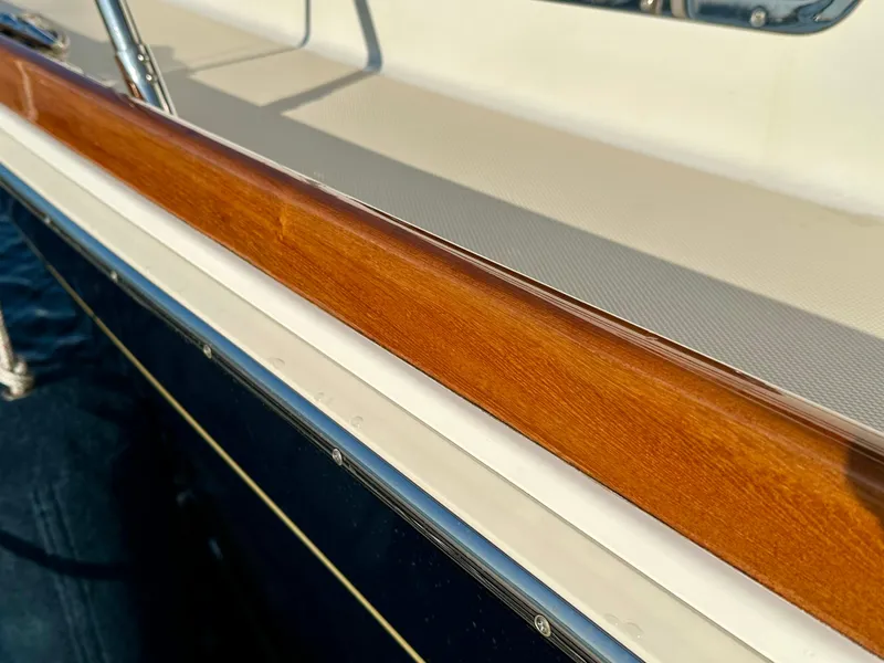 Slide: The Image of 2017 Sabre 42 Salon Express boat with polished wood and sleek design details. - 18
