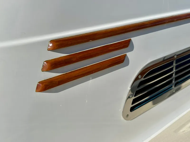 Slide: The Image of 2017 Sabre 42 Salon Express detail with wooden accents and metal vent. - 20