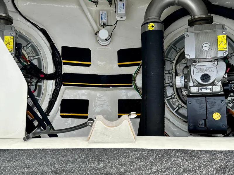 Slide: The Image of Engine room of 2017 Sabre 42 Salon Express with visible mechanical components. - 26