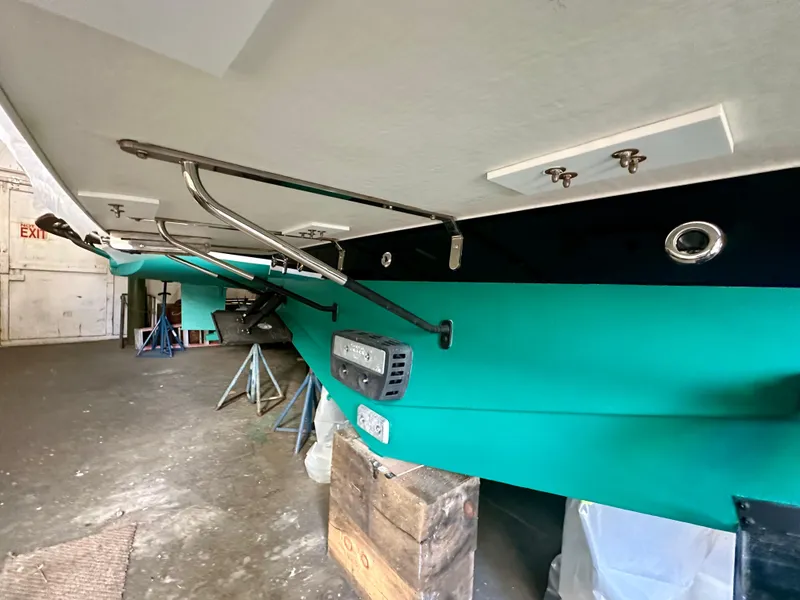 Slide: The Image of 2017 Sabre 42 Salon Express boat in storage, showcasing hull and hardware details. - 29