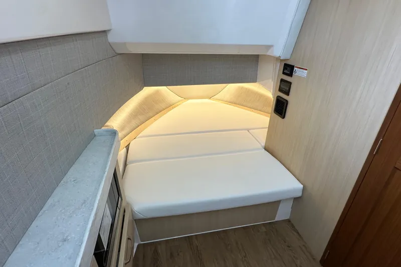 Slide: The Image of 2026 Regal 38 SAV cabin interior with modern lighting and sleek design. - 18