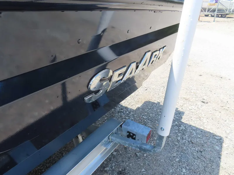 Slide: The Image of 2024 SeaArk Pro Guide 2672 boat, close-up of logo on hull. - 20
