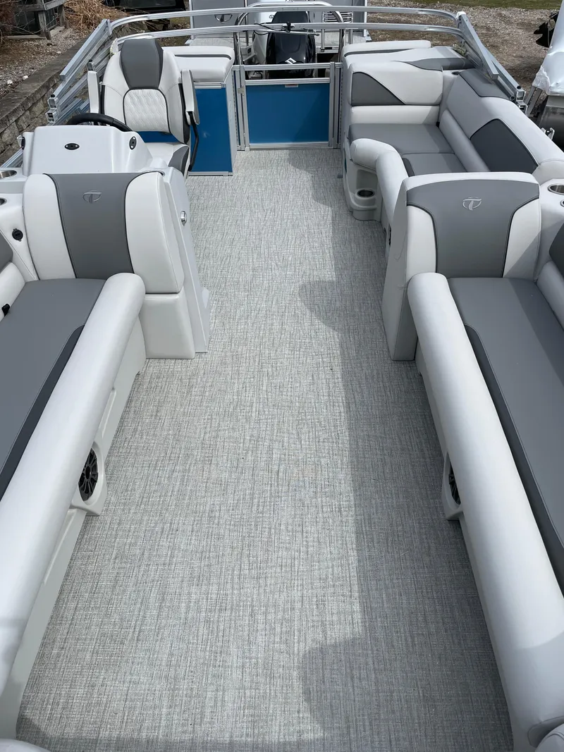 Slide: The Image of 2025 Tahoe 21 Sport 85 boat interior with spacious seating and modern design. - 3