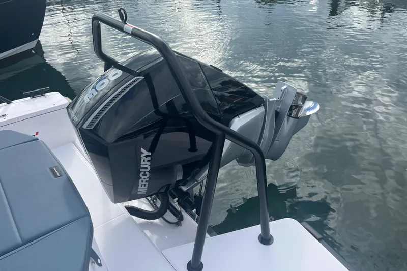 Slide: The Image of 2022 Axopar 28 Cabin with Brabus Package, featuring a Mercury outboard engine. - 37