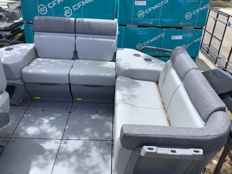 Slide: The Image of 2024 Sea-Doo Switch Cruise 18 interior seating with gray upholstery and modular design. - 6