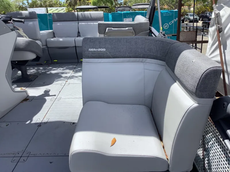 Slide: The Image of 2024 Sea-Doo Switch Cruise 18 interior with gray seating and spacious layout. - 8