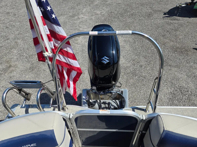 Slide: The Image of 2021 Berkshire 22 RFX LE-Series boat with Suzuki motor and American flag. - 14