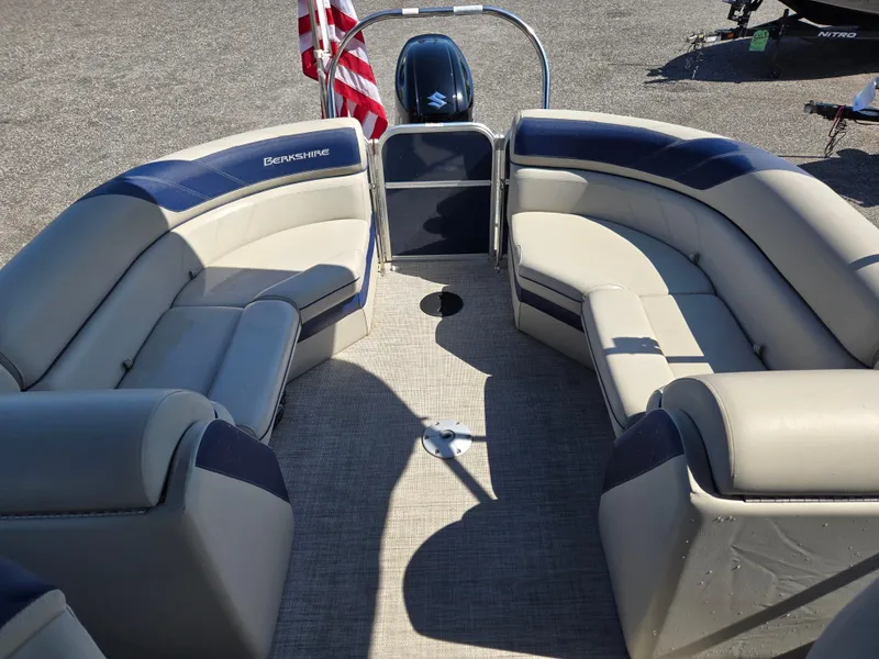 Slide: The Image of 2021 Berkshire 22 RFX LE-Series pontoon boat with spacious seating and American flag. - 15