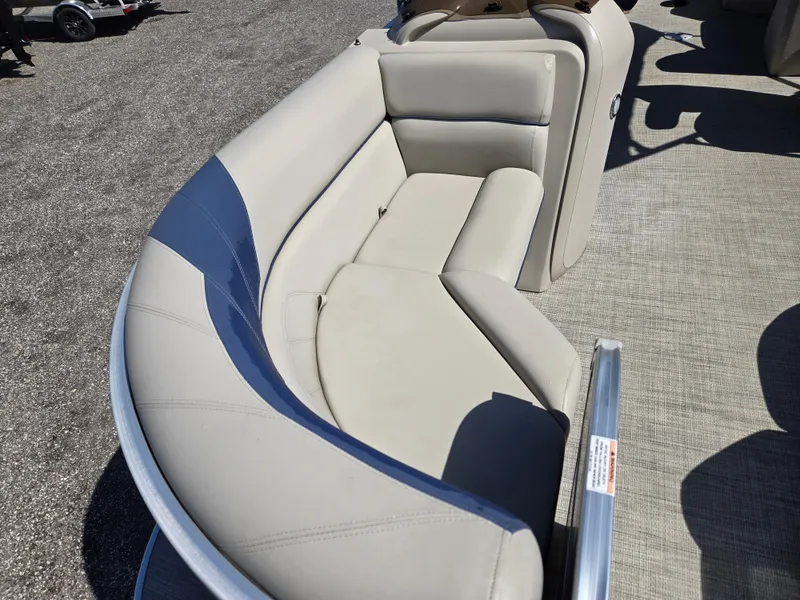 Slide: The Image of 2021 Berkshire 22 RFX LE-Series boat seating with beige and blue upholstery. - 18