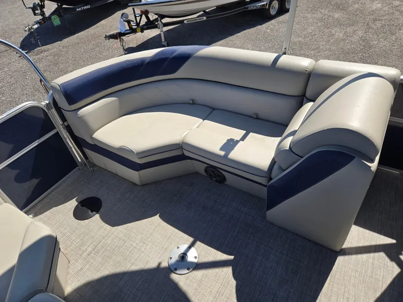 Slide: The Image of 2021 Berkshire 22 RFX LE-Series boat interior with plush seating and modern design. - 9
