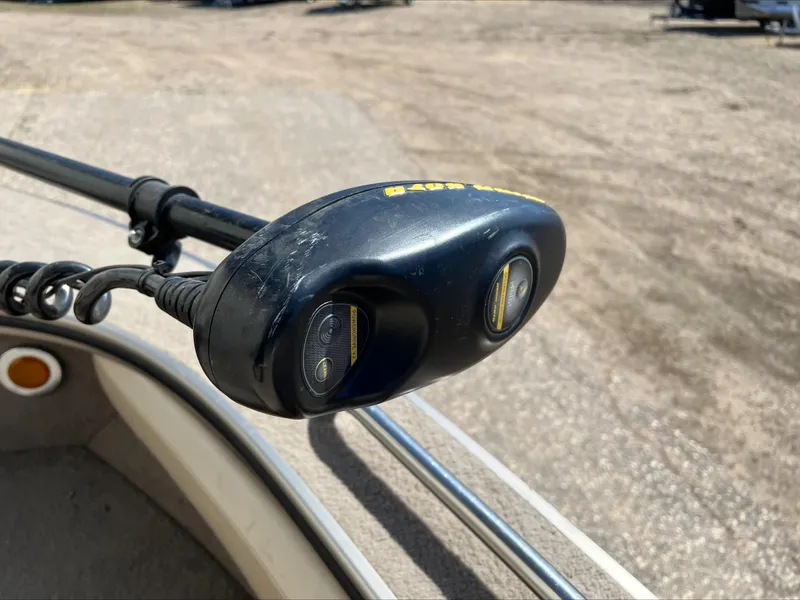 Slide: The Image of Close-up of a boat motor control on a 2001 Alumacraft Trophy 185. - 12