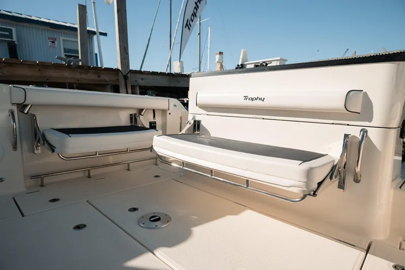 Slide: The Image of 2024 Bayliner Trophy T25 Pilothouse boat interior with foldable seating. - 13